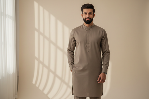 create image of pakistani male model in wash & wear shalwar kameez 